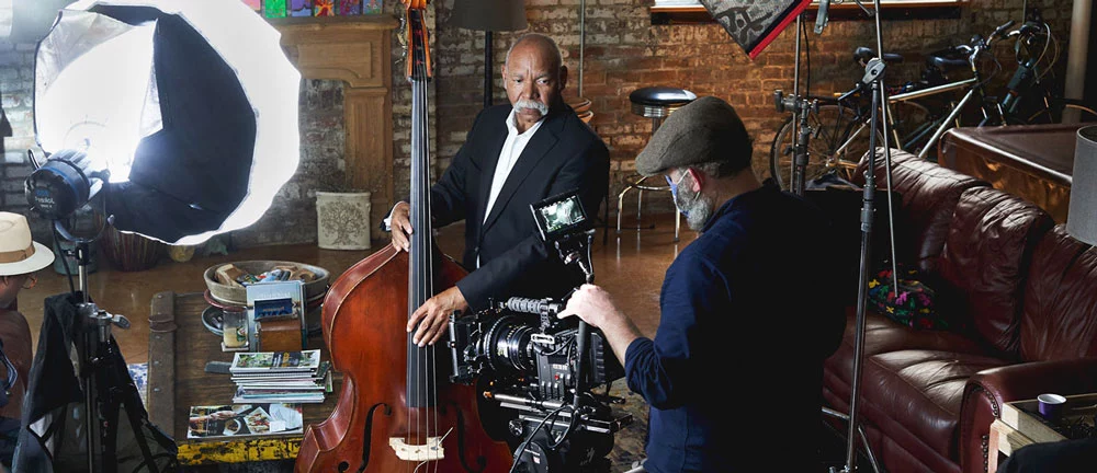 video shoot in new orleans of jazz musician and includes videographer, camera and lighting